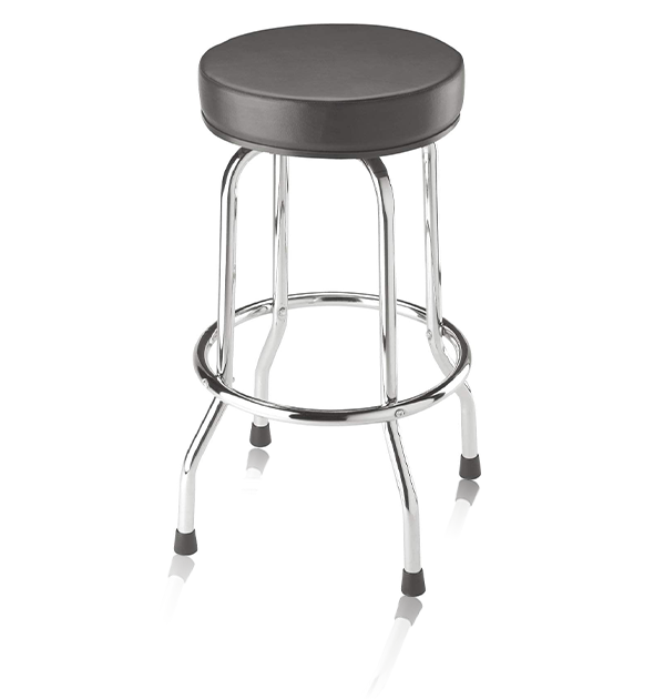 A round, black cushioned stool with a chrome frame and four legs. The stool has a circular footrest attached to the legs, each ending in a rubber tip. Its modern design makes it perfect for gaming setups or as part of your VR accessories collection.